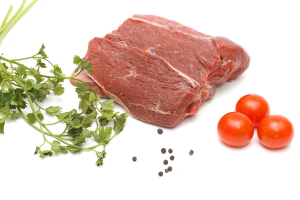 stock image Piece of beef and vegetables on white