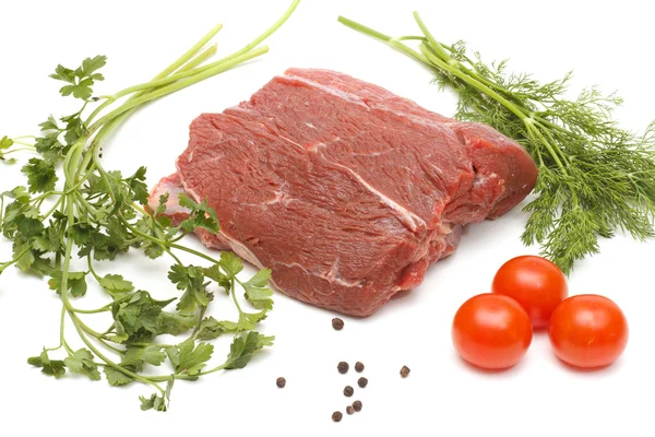stock image Piece of beef and vegetables on white