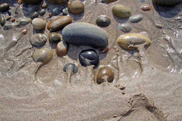 Våt sand på stranden — Stockfoto