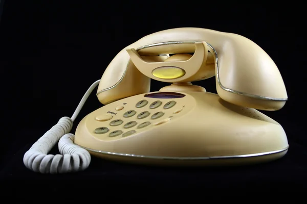 Telefone isolado em preto — Fotografia de Stock