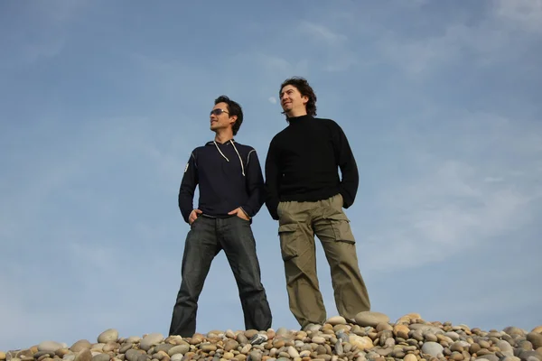 stock image Casual men on beach