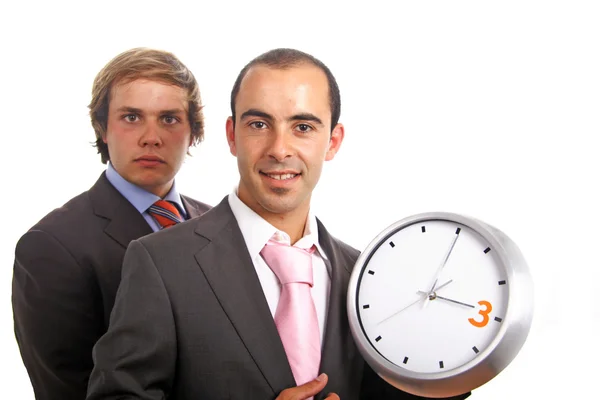 Geschäftsleute mit Uhr — Stockfoto