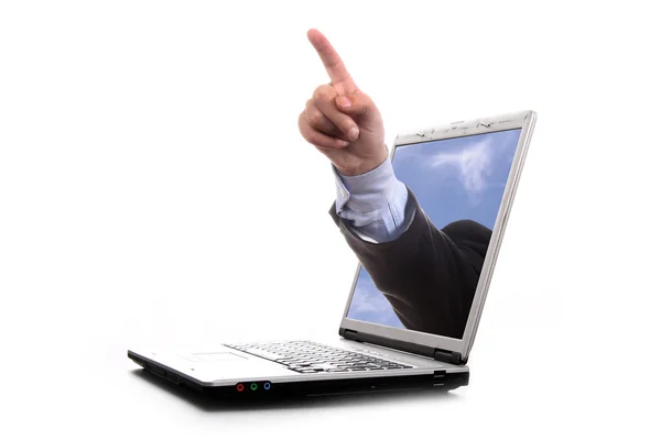 Mão em um laptop preto — Fotografia de Stock