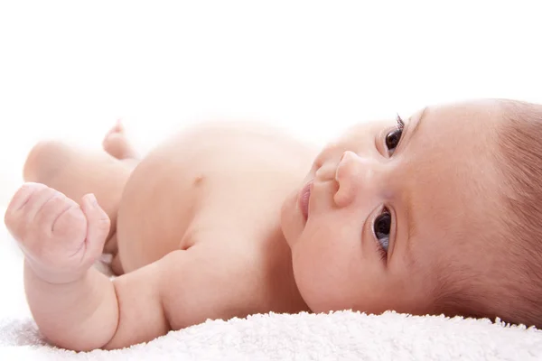 Dítě zabalené v ručníku — Stock fotografie