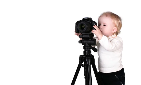 stock image A child with a camera in the studio