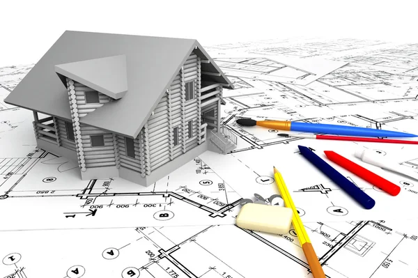 stock image Wooden house on the drawings with stationery