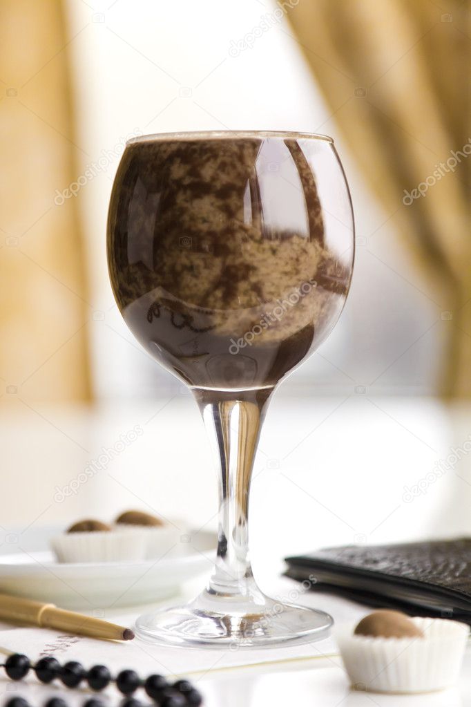 The glass of chocolate cocktail