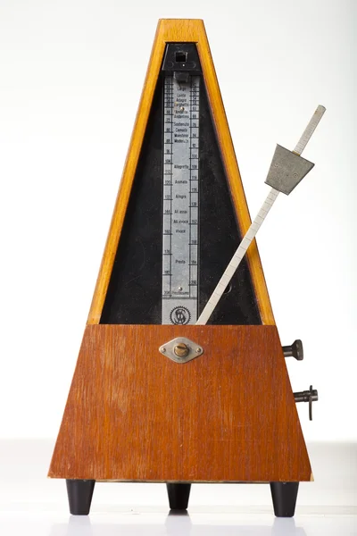 stock image Musical metronome on a white