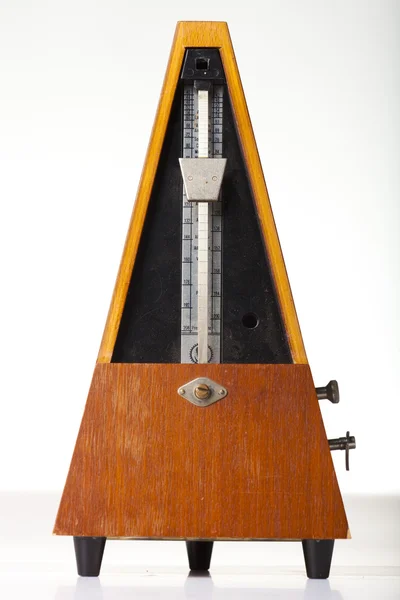 stock image Musical metronome on a white