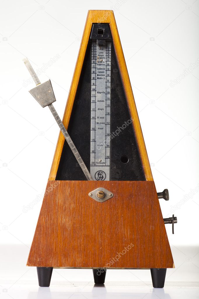 Musical metronome on a white