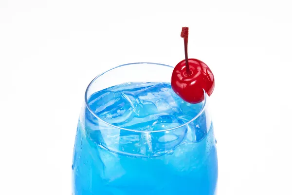Blue lagoon cocktail with ice and cherry — Stock Photo, Image