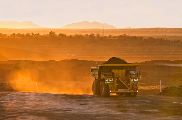 Coal truck at sunrise
