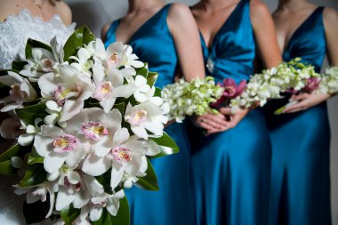 Close up of Bride's bouquet, bridesmaids behind clipart