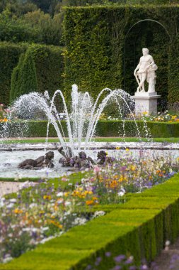 Gardens and fountains at palace versailles clipart