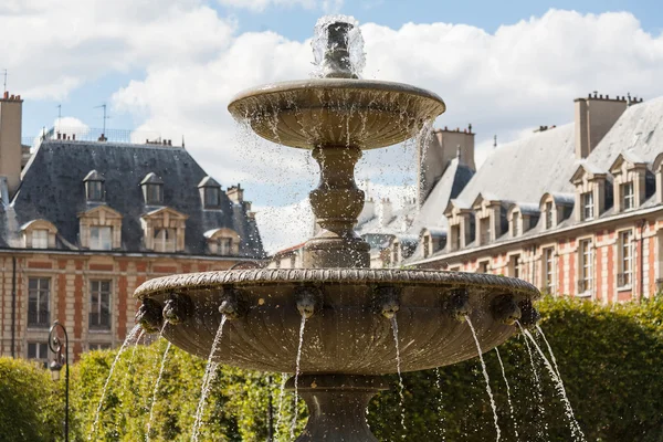 stock image Ornate fountain in Place des Vosges in Paris