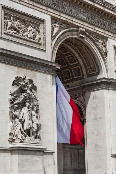 Arc de triomphe szczegółowo pokazano flaga francuski Zdjęcie Stockowe
