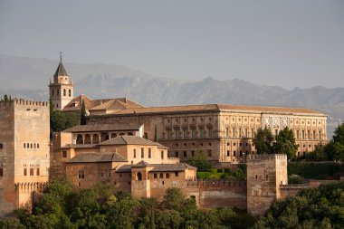 Alhambra palace close up and Alpujarra mountains clipart