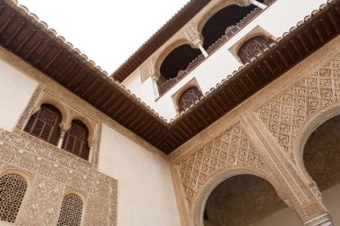 Detailed architecture of the Alhambra palace in Granada clipart