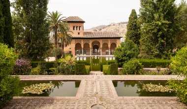 Generalife gardens and palace inside the Alhambra in Granada clipart