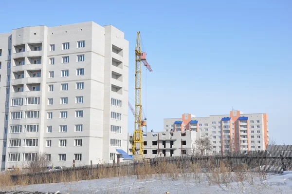 Modernization of rural to urban areas. Construction of multi-storey buildings. — Stock Photo, Image