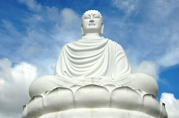 Buddha auf einem Lotus sitzend. Stockfoto