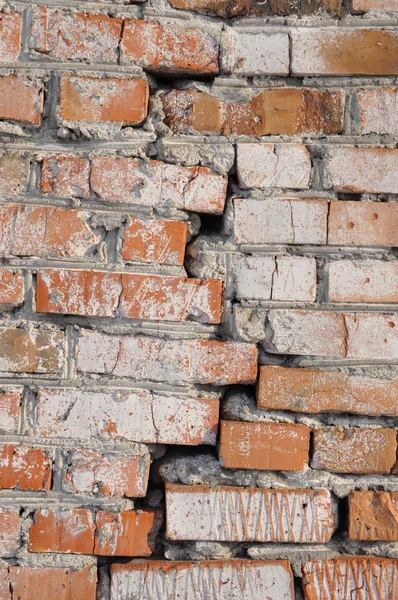 La fissure dans le mur de briques. Texture . — Photo
