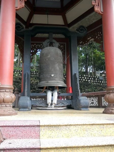 stock image The man inside the bell.