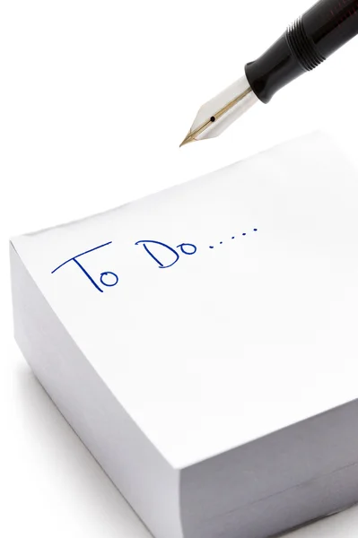 stock image To do list written on post it note pad