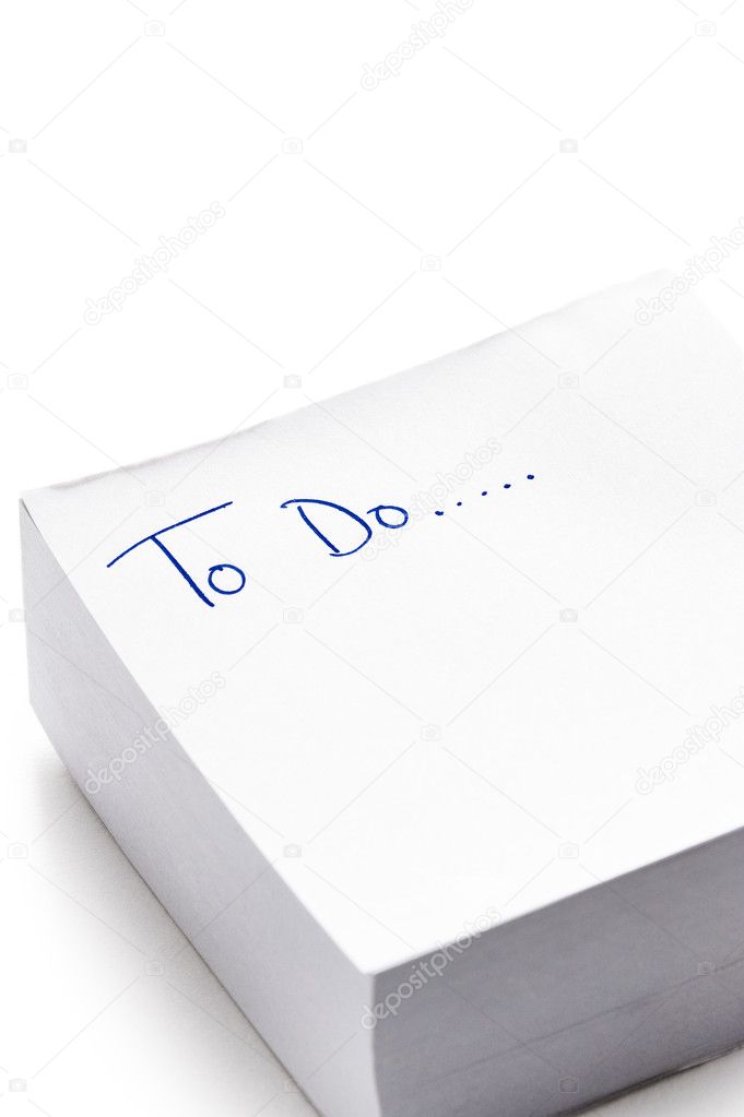 To do list written on post it note pad