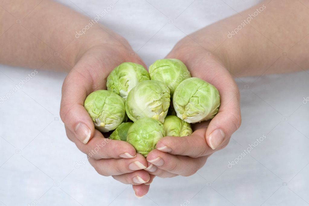 Brussel sprouts in hands