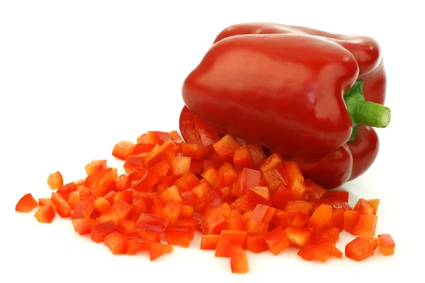 Fresh red bellpepper with cut pieces — Stock Photo, Image