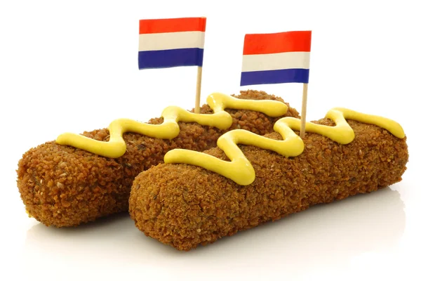 Two Dutch snacks called "kroket" with mustard — Stock Photo, Image