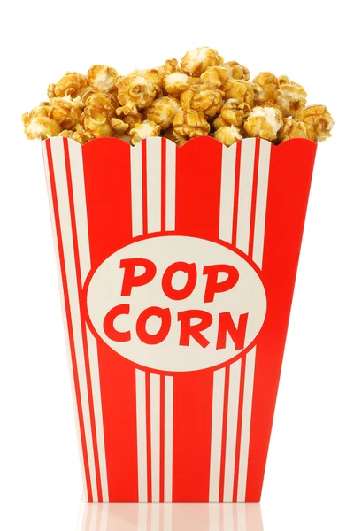 stock image Caramel popcorn in a decorative paper popcorn cup