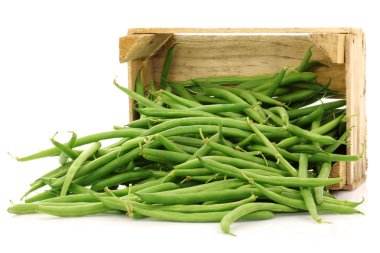 Bunch of green beans in a wooden box