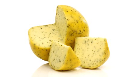 Cut traditional Gouda cheese with herbs clipart