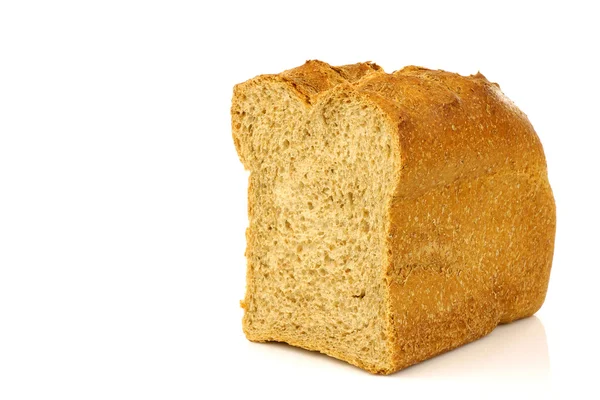 Cut loaf of wholemeal bread — Stock Photo, Image