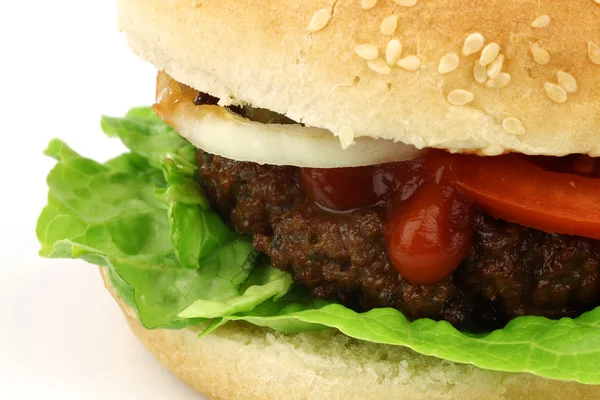 Fresh homemade hamburger with lettuce, tomatoes, onions and sauce — Stock Photo, Image