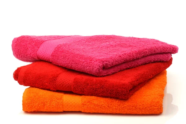 Asciugamani da bagno impilati colorati — Foto Stock
