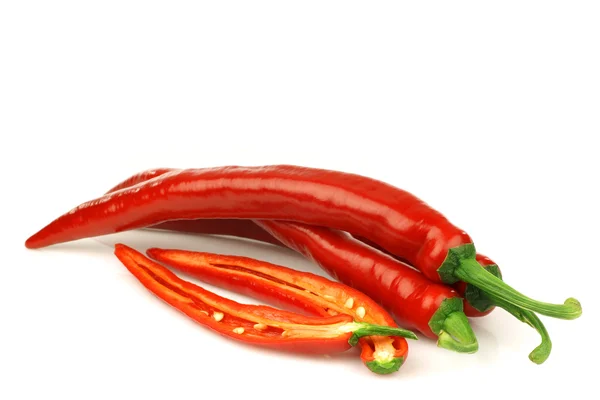 Cut red hot chili peppers (Capsicum) — Stock Photo, Image