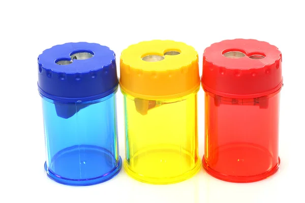 Üç renkli plastik kalem sharpeners — Stok fotoğraf