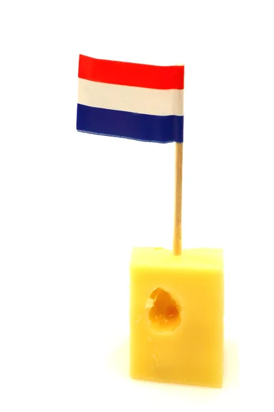 Dutch cheese with a little Dutch flag toothpick — Stock Photo, Image