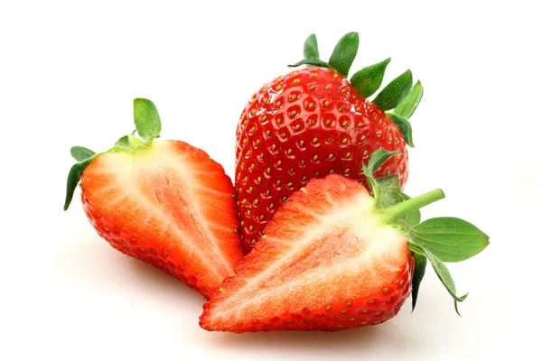 Fresh strawberry and two halves — Stock Photo, Image