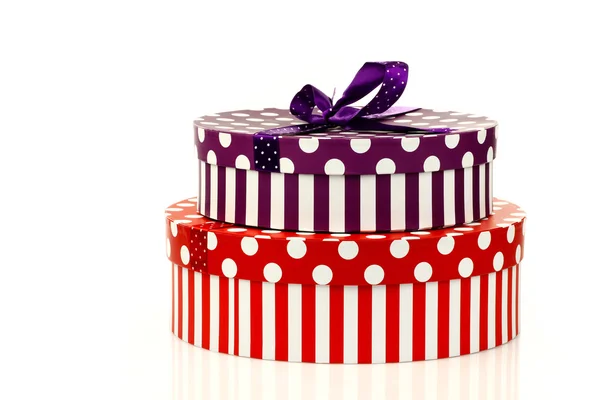 Red and purple striped gift boxes — Stock Photo, Image