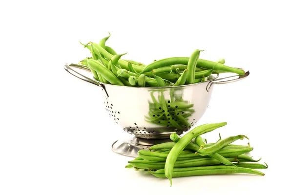 Green beans in a metal colander — Stock Photo, Image