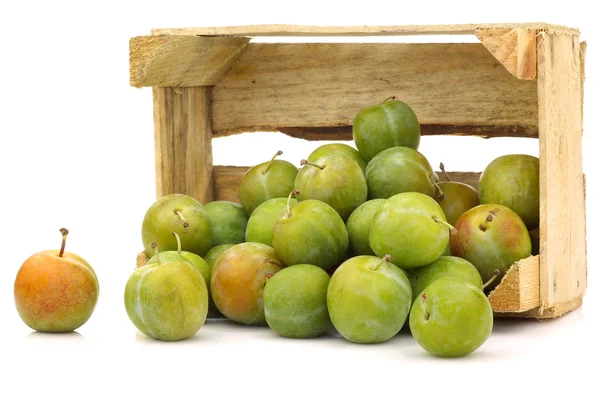 Fresh "Reine Claude" plums in a wooden crate — Stock Photo, Image