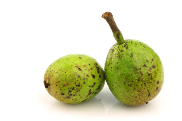 Two fresh walnuts (Juglans regia) — Stock Photo, Image
