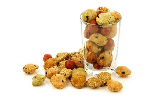 Japanese snack balls filled with peanuts in a glass — Stock Photo, Image