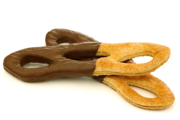 Traditional sugar and chocolate coated Dutch cookies called "krakeling" — Stock Photo, Image