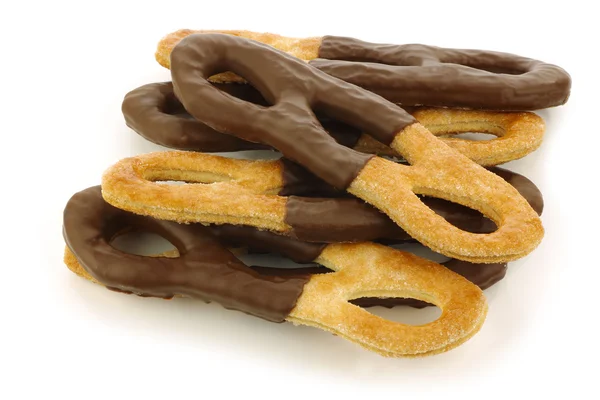 Traditional sugar and chocolate coated Dutch cookies called "krakeling" — Stock Photo, Image