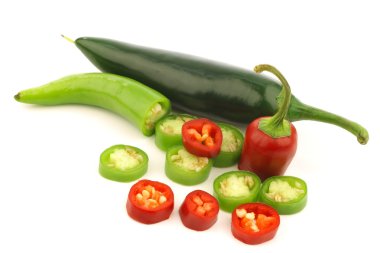 Red and green cut peppers clipart